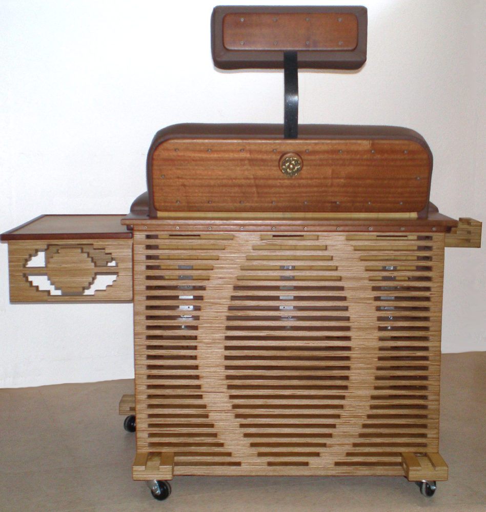 Back of the Ogden Chair with Head Rest, Side Table, and Cupholder Accessories